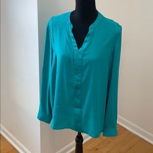 Women’s turquoise blouse